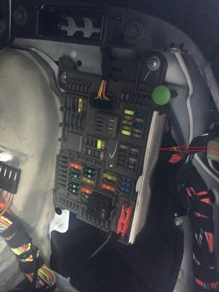  photo of the fuse box in the trunk of a bmw x6 e71